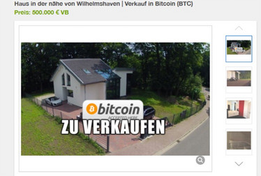 Ein Bild eines Hauses mit Bitcoin-Schriftzug