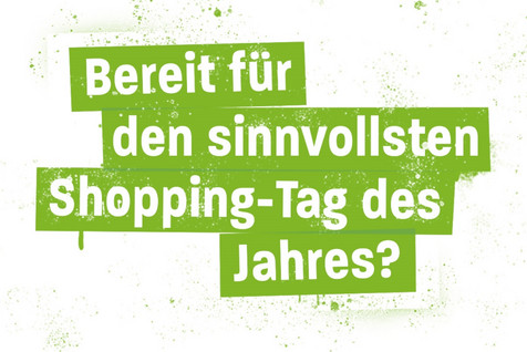 Schriftzug “Bereit für den sinnvollsten Shopping-Tag des Jahres?” auf hellgrünem Spray-Hintergrund